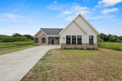 Welcome to 22202 Field Street - A Distinguished Retreat in White on White Bluff Resort - New Course in Texas - for sale on GolfHomes.com, golf home, golf lot