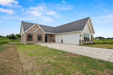 Welcome to 22202 Field Street - A Distinguished Retreat in White on White Bluff Resort - New Course in Texas - for sale on GolfHomes.com, golf home, golf lot