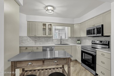 This FULLY-FURNISHED END-UNIT feels more like a ranch-style on Belvedere Country Club in North Carolina - for sale on GolfHomes.com, golf home, golf lot