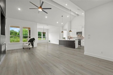 Welcome to 22202 Field Street - A Distinguished Retreat in White on White Bluff Resort - New Course in Texas - for sale on GolfHomes.com, golf home, golf lot