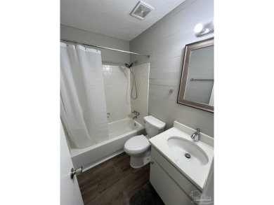 Turn key 2 bedroom, one bath condo in terrific Gulf Breeze on Tiger Point Golf and Country Club in Florida - for sale on GolfHomes.com, golf home, golf lot