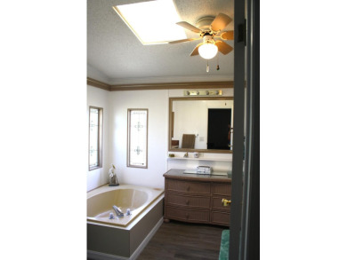 LAND OWNED -  Spacious & Open Floor Plan, this 2/2 has large on Savanna Golf Club in Florida - for sale on GolfHomes.com, golf home, golf lot