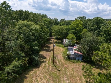 Here is an incredible opportunity to own a 6.44 M/L mostly on Lost Woods Golf Course in Missouri - for sale on GolfHomes.com, golf home, golf lot