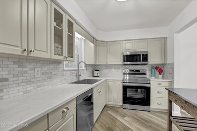 This FULLY-FURNISHED END-UNIT feels more like a ranch-style on Belvedere Country Club in North Carolina - for sale on GolfHomes.com, golf home, golf lot