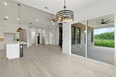 Welcome to 22202 Field Street - A Distinguished Retreat in White on White Bluff Resort - New Course in Texas - for sale on GolfHomes.com, golf home, golf lot