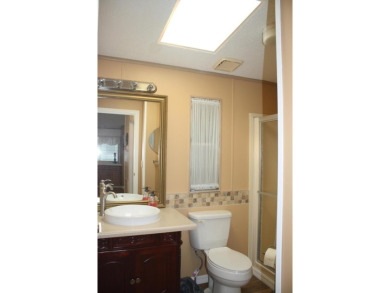 LAND OWNED -  Spacious & Open Floor Plan, this 2/2 has large on Savanna Golf Club in Florida - for sale on GolfHomes.com, golf home, golf lot