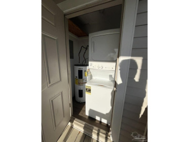 Turn key 2 bedroom, one bath condo in terrific Gulf Breeze on Tiger Point Golf and Country Club in Florida - for sale on GolfHomes.com, golf home, golf lot