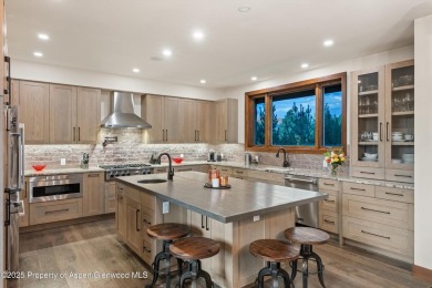 The ultimate setting for this gracious ''modern lodge'' style on River Valley Ranch Golf Club in Colorado - for sale on GolfHomes.com, golf home, golf lot