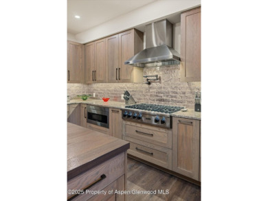 The ultimate setting for this gracious ''modern lodge'' style on River Valley Ranch Golf Club in Colorado - for sale on GolfHomes.com, golf home, golf lot