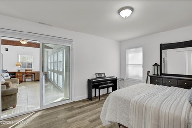 This FULLY-FURNISHED END-UNIT feels more like a ranch-style on Belvedere Country Club in North Carolina - for sale on GolfHomes.com, golf home, golf lot