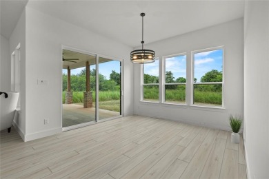 Welcome to 22202 Field Street - A Distinguished Retreat in White on White Bluff Resort - New Course in Texas - for sale on GolfHomes.com, golf home, golf lot