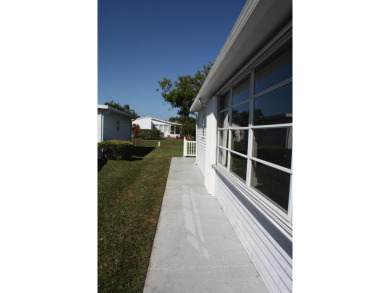 LAND OWNED -  Spacious & Open Floor Plan, this 2/2 has large on Savanna Golf Club in Florida - for sale on GolfHomes.com, golf home, golf lot