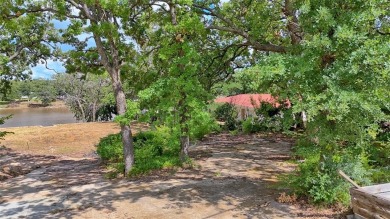 If you are interested in owning a residential waterfront lot on on Twisted Oaks Golf Club in Texas - for sale on GolfHomes.com, golf home, golf lot