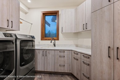 The ultimate setting for this gracious ''modern lodge'' style on River Valley Ranch Golf Club in Colorado - for sale on GolfHomes.com, golf home, golf lot