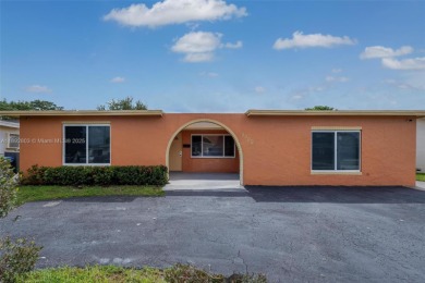 Welcome to your waterfront oasis in Sunrise Golf Village! This on Sunrise Lakes Phase III in Florida - for sale on GolfHomes.com, golf home, golf lot