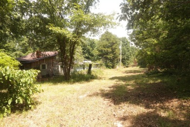 Here is an incredible opportunity to own a 6.44 M/L mostly on Lost Woods Golf Course in Missouri - for sale on GolfHomes.com, golf home, golf lot