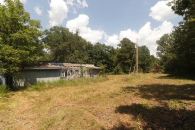 Here is an incredible opportunity to own a 6.44 M/L mostly on Lost Woods Golf Course in Missouri - for sale on GolfHomes.com, golf home, golf lot