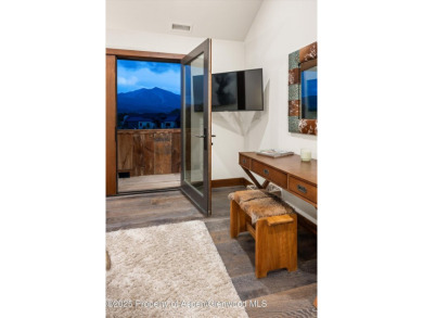 The ultimate setting for this gracious ''modern lodge'' style on River Valley Ranch Golf Club in Colorado - for sale on GolfHomes.com, golf home, golf lot