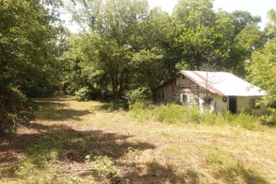 Here is an incredible opportunity to own a 6.44 M/L mostly on Lost Woods Golf Course in Missouri - for sale on GolfHomes.com, golf home, golf lot