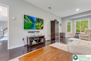 Located in the amenity-filled golf course community Country Club on Country Club of the Poconos Golf Course in Pennsylvania - for sale on GolfHomes.com, golf home, golf lot