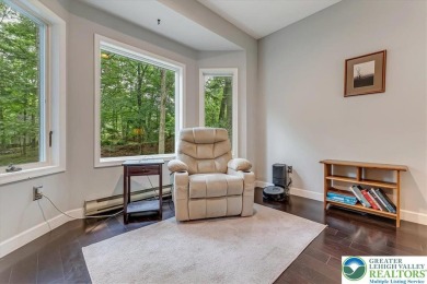 Located in the amenity-filled golf course community Country Club on Country Club of the Poconos Golf Course in Pennsylvania - for sale on GolfHomes.com, golf home, golf lot