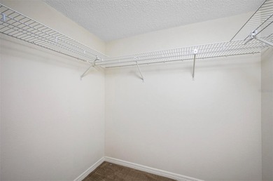 Charming and quiet 2-bedroom, 2-bath condo overlooking lush on Feather Sound Country Club in Florida - for sale on GolfHomes.com, golf home, golf lot