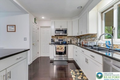 Located in the amenity-filled golf course community Country Club on Country Club of the Poconos Golf Course in Pennsylvania - for sale on GolfHomes.com, golf home, golf lot