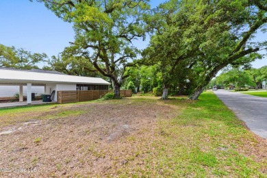 Corner lot adorned with magnificent live oaks, nestled in the on The Bridges Golf Club At Hollywood Casino in Mississippi - for sale on GolfHomes.com, golf home, golf lot