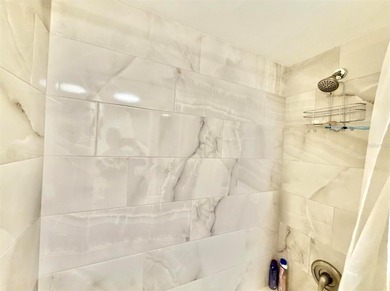 Charming and quiet 2-bedroom, 2-bath condo overlooking lush on Feather Sound Country Club in Florida - for sale on GolfHomes.com, golf home, golf lot