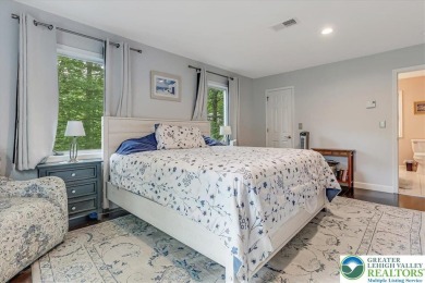 Located in the amenity-filled golf course community Country Club on Country Club of the Poconos Golf Course in Pennsylvania - for sale on GolfHomes.com, golf home, golf lot