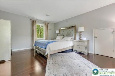 Located in the amenity-filled golf course community Country Club on Country Club of the Poconos Golf Course in Pennsylvania - for sale on GolfHomes.com, golf home, golf lot