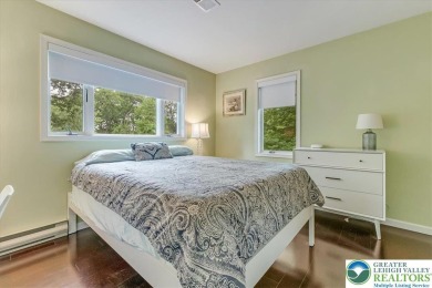Located in the amenity-filled golf course community Country Club on Country Club of the Poconos Golf Course in Pennsylvania - for sale on GolfHomes.com, golf home, golf lot