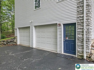 Located in the amenity-filled golf course community Country Club on Country Club of the Poconos Golf Course in Pennsylvania - for sale on GolfHomes.com, golf home, golf lot