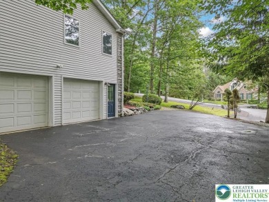 Located in the amenity-filled golf course community Country Club on Country Club of the Poconos Golf Course in Pennsylvania - for sale on GolfHomes.com, golf home, golf lot