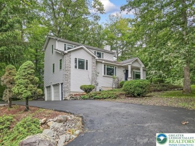 Located in the amenity-filled golf course community Country Club on Country Club of the Poconos Golf Course in Pennsylvania - for sale on GolfHomes.com, golf home, golf lot