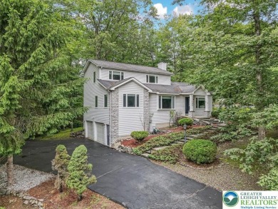 Located in the amenity-filled golf course community Country Club on Country Club of the Poconos Golf Course in Pennsylvania - for sale on GolfHomes.com, golf home, golf lot