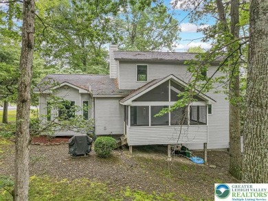 Located in the amenity-filled golf course community Country Club on Country Club of the Poconos Golf Course in Pennsylvania - for sale on GolfHomes.com, golf home, golf lot