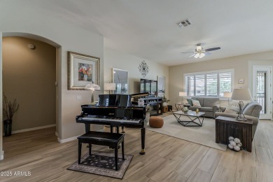 Enjoy this updated Sedona floor plan with stunning mountain on Lone Tree Golf Club in Arizona - for sale on GolfHomes.com, golf home, golf lot