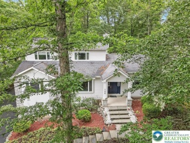 Located in the amenity-filled golf course community Country Club on Country Club of the Poconos Golf Course in Pennsylvania - for sale on GolfHomes.com, golf home, golf lot