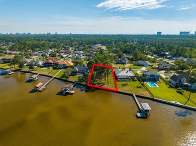 TRANQUIL BAYFRONT OPPORTUNITY | 101.1' OF WEST BAY FRONTAGE WITH on Holiday Golf Club in Florida - for sale on GolfHomes.com, golf home, golf lot