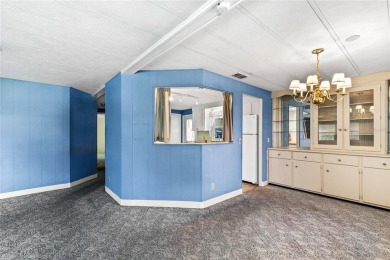 Well-maintained 2-bedroom, 2-bath manufactured home located in on Zellwood Station Country Club in Florida - for sale on GolfHomes.com, golf home, golf lot