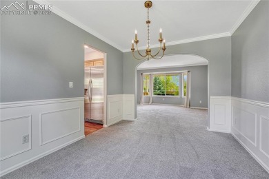 Nestled on a tree-lined street in the heart of District 20 and on Pine Creek Golf Club in Colorado - for sale on GolfHomes.com, golf home, golf lot