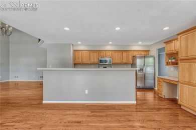 Nestled on a tree-lined street in the heart of District 20 and on Pine Creek Golf Club in Colorado - for sale on GolfHomes.com, golf home, golf lot