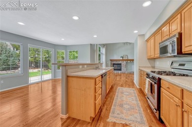 Nestled on a tree-lined street in the heart of District 20 and on Pine Creek Golf Club in Colorado - for sale on GolfHomes.com, golf home, golf lot