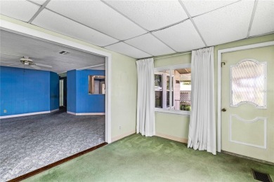 Well-maintained 2-bedroom, 2-bath manufactured home located in on Zellwood Station Country Club in Florida - for sale on GolfHomes.com, golf home, golf lot