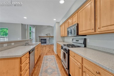 Nestled on a tree-lined street in the heart of District 20 and on Pine Creek Golf Club in Colorado - for sale on GolfHomes.com, golf home, golf lot