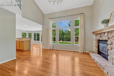 Nestled on a tree-lined street in the heart of District 20 and on Pine Creek Golf Club in Colorado - for sale on GolfHomes.com, golf home, golf lot