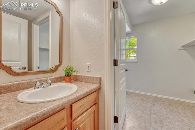 Nestled on a tree-lined street in the heart of District 20 and on Pine Creek Golf Club in Colorado - for sale on GolfHomes.com, golf home, golf lot