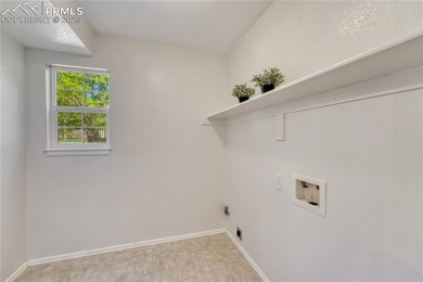 Nestled on a tree-lined street in the heart of District 20 and on Pine Creek Golf Club in Colorado - for sale on GolfHomes.com, golf home, golf lot