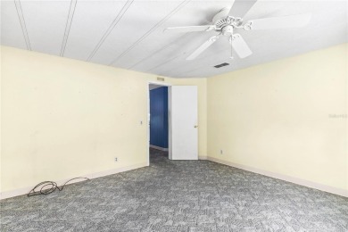Well-maintained 2-bedroom, 2-bath manufactured home located in on Zellwood Station Country Club in Florida - for sale on GolfHomes.com, golf home, golf lot